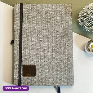 دفتر یادداشت تبلیغاتی همراه با کش و جای خودکار